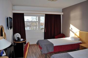 Фото номера Двухместный номер с 2 отдельными кроватями Отель Finlandia Hotel Aquarius г. Уусикаупунки 2